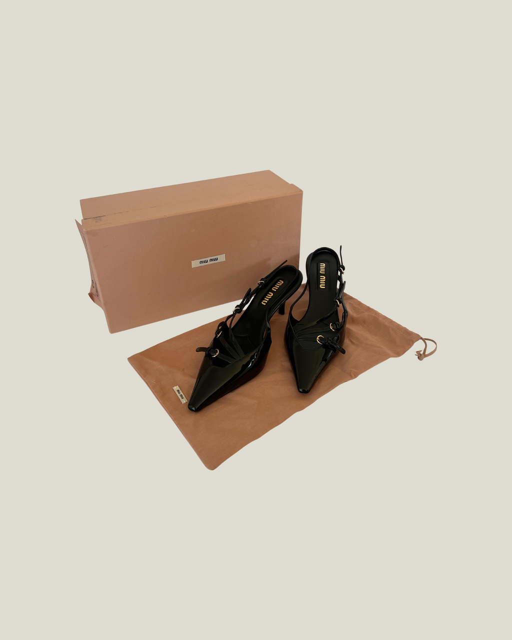 Miu Miu Patent Leather Slingbacks with Buckles